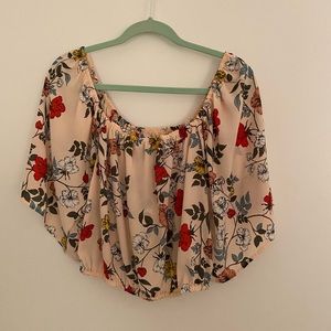 Light pink floral top.